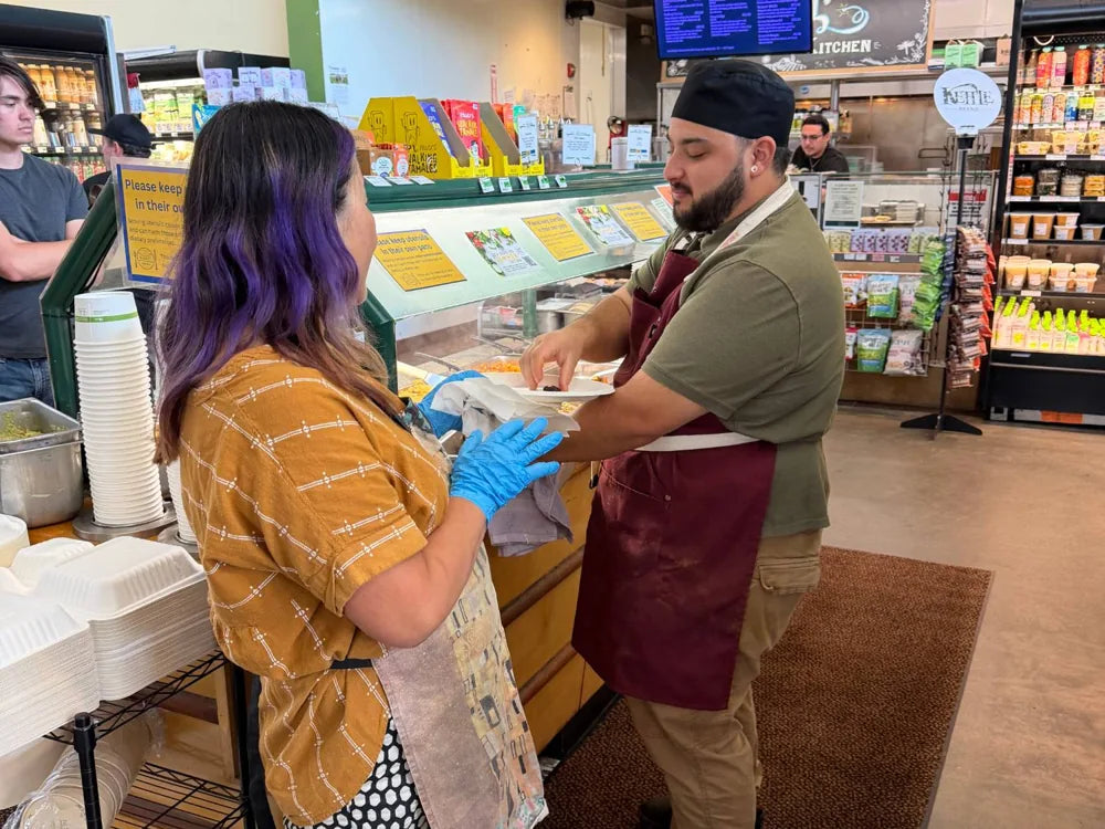Sharing a taste with the deli team