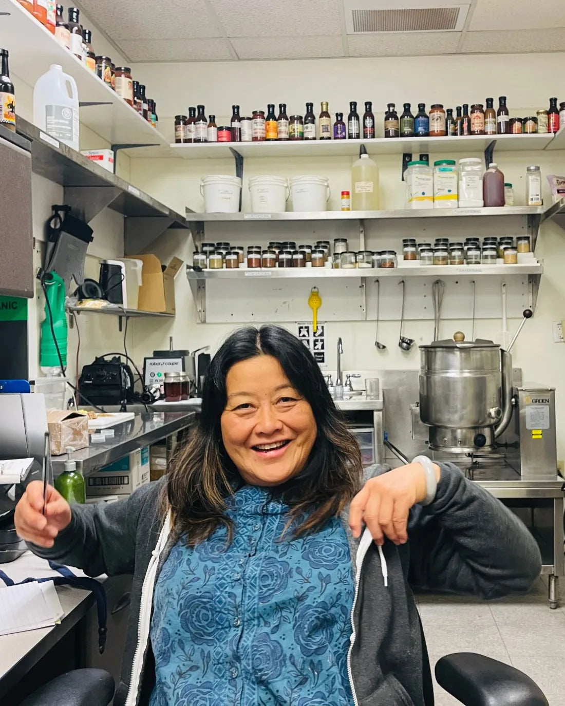 Wei Wei smiling in the Funky Beans kitchen